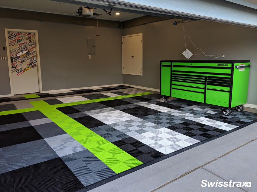 Green, black and gray Swisstrax garage floor with matching tool cabinet. Green, black and gray Swisstrax garage floor with matching tool cabinet.