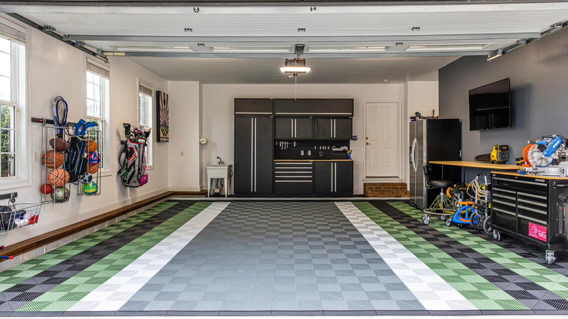 Black, gray, white and green Swisstrax garage floor design Black, gray, white and green Swisstrax garage floor design